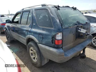 2001 Isuzu Rodeo S with VIN 4S2CK58W614344850, listed as a Copart auction lot 63807664 with 176,203 mi miles and Salvage title. Bid and sale history available at DreamBid. Image 2.