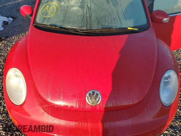 2009 Volkswagen Beetle S with VIN 3VWRF31Y59M410019, listed as a Copart auction lot 77861384 with Not provided miles and Salvage title. Bid and sale history available at DreamBid. Image 11.
