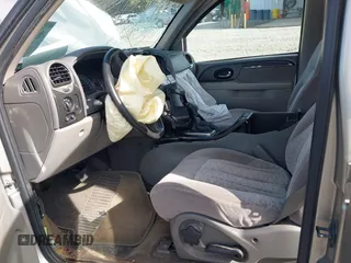 2003 GMC Envoy SLT with VIN 1GKDS13SX32203909, listed as a IAAI auction lot 41457713 with 199,507 mi miles. Bid and sale history available at carsss.com. Image 5.