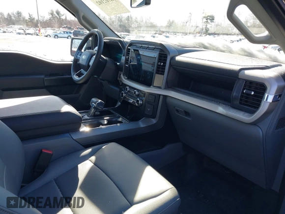 2023 Ford F-150 Lightning Pro with VIN 1FTVW1EL7PWG07081, listed as a IAAI auction lot 38702102 with 9,976 mi miles and . Bid and sale history available at DreamBid. Image 5.