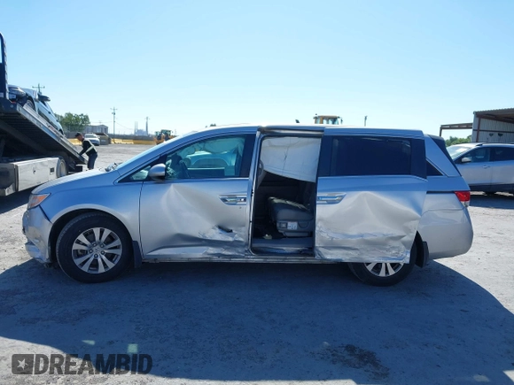 2014 Honda Odyssey EX-L with VIN 5FNRL5H63EB041106, listed as a IAAI auction lot 42294113 with 122,610 mi miles and . Bid and sale history available at DreamBid. Image 15.