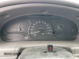 1999 Ford Escort LX with VIN 1FAFP10P7XW221648, listed as a Copart auction lot 71844334 with 140,899 mi miles and Salvage Title. Bid and sale history available at carsss.com. Image 9.
