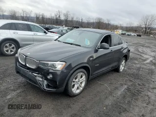 2015 BMW X4 xDrive28i with VIN 5UXXW3C54F0M89256, listed as a Copart auction lot 41388973 with 136,359 mi miles. Bid and sale history available at carsss.com. Image 1.