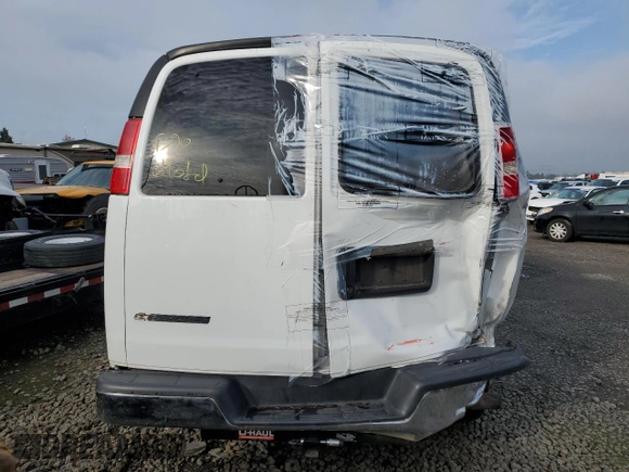 2018 Chevrolet Express Passenger LT with VIN 1GAZGPFG3J1245055, listed as a Copart auction lot 87807965 with 106,634 mi miles and Salvage title. Bid and sale history available at DreamBid. Image 6.