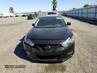 2018 Nissan Maxima SR with VIN 1N4AA6AP9JC371440, listed as a Copart auction lot 75309784 with 68,459 mi miles and Salvage Title. Bid and sale history available at carsss.com. Image 11.