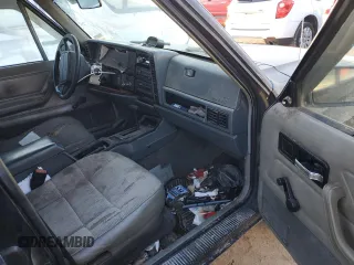 1996 Jeep Cherokee Sport with VIN 1J4FJ68S8TL244251, listed as a Copart auction lot 42321635 with 168,354 mi miles and Salvage Title. Bid and sale history available at carsss.com. Image 8.