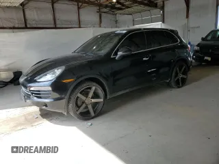 2012 Porsche Cayenne Turbo S E-Hybrid with VIN WP1AA2A23CLA05563, listed as a Copart auction lot 61990455 with 151,977 mi miles and Clean title. Bid and sale history available at DreamBid. Image 1.