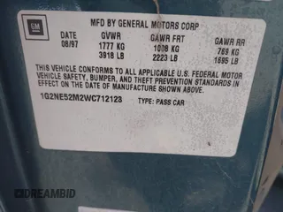 1998 Pontiac Grand Am SE with VIN 1G2NE52M2WC712123, listed as a IAAI auction lot 41939392 with 307,145 mi miles. Bid and sale history available at carsss.com. Image 9.