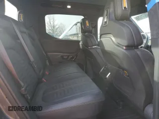 2022 Rivian R1T Adventure z VIN 7FCTGAAA5NN014941, wystawiony jako Copart lot #43771755 z przebiegiem 43 410 mil mil oraz Szkody całkowita. Historia ofert i sprzedaży dostępna na DreamBid. Obrazek 10.