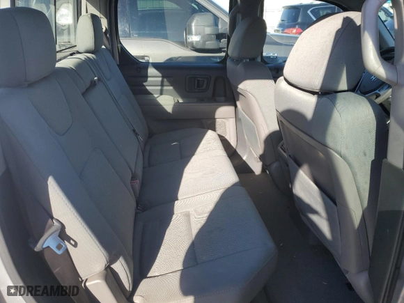 2010 Honda Ridgeline RT with VIN 5FPYK1F28AB008613, listed as a Copart auction lot 43267065 with 145,405 mi miles and Salvage Title. Bid and sale history available at carsss.com. Image 10.