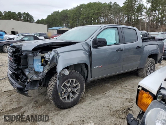 2022 GMC Canyon 4WD AT4 z VIN 1GTG6FENXN1274389, wystawiony jako Copart lot #85255404 z przebiegiem 42 843 mil mil oraz Szkoda całkowita • Salvage title. Historia ofert i sprzedaży dostępna na DreamBid. Obrazek 1.
