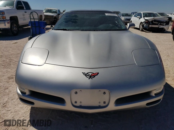 2004 Chevrolet Corvette with VIN 1G1YY22G945102769, listed as a Copart auction lot 74500664 with 64,718 mi miles and Salvage Title. Bid and sale history available at carsss.com. Image 5.