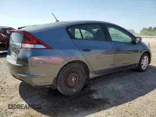 2012 Honda Insight z VIN JHMZE2H34CS003929, wystawiony jako Copart lot #52707885 z przebiegiem 131 596 mil mil oraz Szkoda całkowita • Salvage title. Historia ofert i sprzedaży dostępna na DreamBid. Obrazek 3.