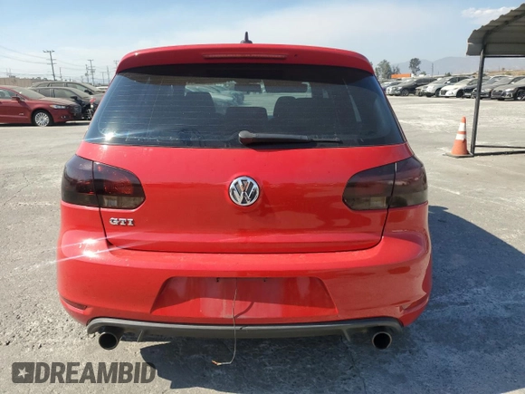 2012 Volkswagen GTI w/Conv & Sunroof z VIN WVWEV7AJ8CW148101, wystawiony jako Copart lot #74610214 z przebiegiem 154 813 mil mil oraz Szkoda całkowita • Salvage title. Historia ofert i sprzedaży dostępna na DreamBid. Obrazek 6.