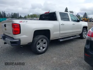2015 Chevrolet Silverado 1500 LTZ with VIN 3GCUKSEC8FG156673, listed as a IAAI auction lot 42066694 with 70,163 mi miles and . Bid and sale history available at DreamBid. Image 4.
