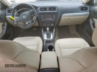 2014 Volkswagen Jetta SE with VIN 3VWD07AJ6EM209228, listed as a Copart auction lot 60500525 with 118,261 mi miles and Salvage title. Bid and sale history available at DreamBid. Image 8.