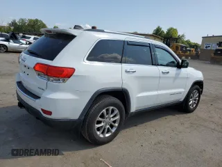 2014 Jeep Grand Cherokee Limited with VIN 1C4RJFBG2EC121152, listed as a Copart auction lot 68676144 with 145,891 mi miles and Salvage title. Bid and sale history available at DreamBid. Image 3.