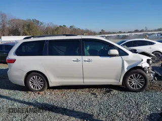 2016 Toyota Sienna XLE with VIN 5TDYK3DC9GS754220, listed as a IAAI auction lot 41303870 with 152,758 mi miles. Bid and sale history available at carsss.com. Image 14.
