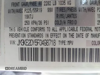 2015 Mazda CX-5 Grand Touring with VIN JM3KE2DY5F0498718, listed as a IAAI auction lot 42070000 with 129,327 mi miles. Bid and sale history available at carsss.com. Image 9.