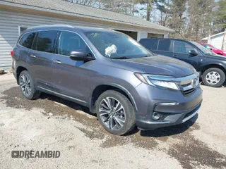 2021 Honda Pilot Elite with VIN 5FNYF6H07MB024540, listed as a IAAI auction lot 41780447 with 63,401 mi miles. Bid and sale history available at carsss.com. Image 1.