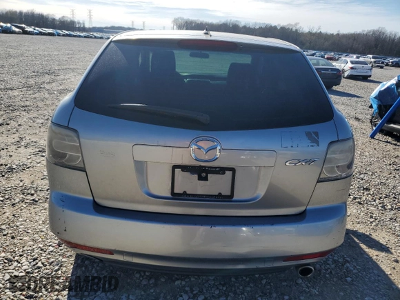 2012 Mazda CX-7 i SV z VIN JM3ER2A5XC0419471, wystawiony jako Copart lot #49677325 z przebiegiem 112 551 mil mil oraz Czysty tytuł • Clean title. Historia ofert i sprzedaży dostępna na DreamBid. Obrazek 6.