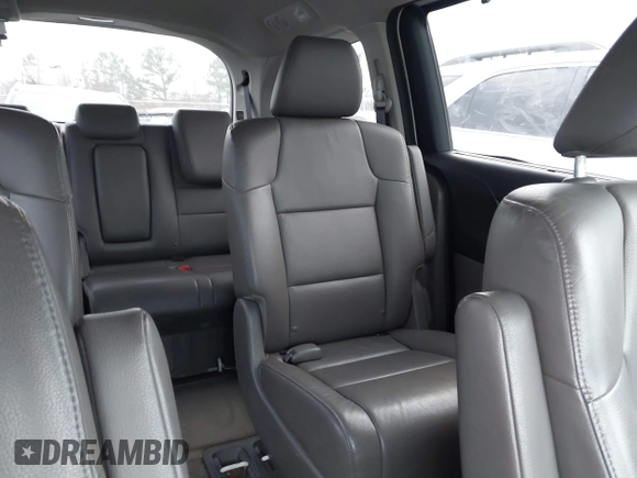2014 Honda Odyssey Touring with VIN 5FNRL5H94EB001479, listed as a IAAI auction lot 41123678 with 147,269 mi miles and . Bid and sale history available at carsss.com. Image 8.