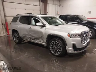2020 GMC Acadia Denali with VIN 1GKKNXLS9LZ215459, listed as a IAAI auction lot 40815587 with 58,389 mi miles. Bid and sale history available at carsss.com. Image 1.