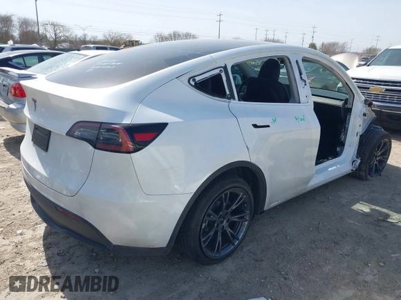 2024 Tesla Model Y with VIN 7SAYGDEDXRA300743, listed as a IAAI auction lot 41690374 with 12,446 mi miles and . Bid and sale history available at DreamBid. Image 4.