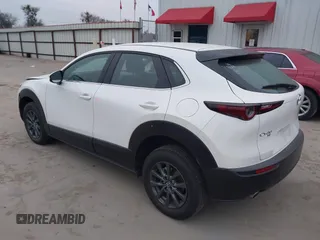 2022 Mazda CX-30 S with VIN 3MVDMBALXNM422418, listed as a IAAI auction lot 41531552 with 21,909 mi miles and . Bid and sale history available at carsss.com. Image 3.