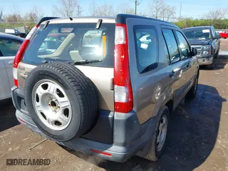 2006 Honda CR-V LX with VIN SHSRD68516U404121, listed as a IAAI auction lot 41981673 with 229,028 mi miles. Bid and sale history available at carsss.com. Image 4.