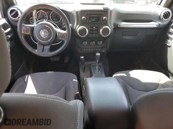 2017 Jeep Wrangler Unlimited Rubicon z VIN 1C4BJWFG6HL724069, wystawiony jako Copart lot #55773055 z przebiegiem 64 515 mil mil oraz Szkoda całkowita • Salvage title. Historia ofert i sprzedaży dostępna na DreamBid. Obrazek 8.