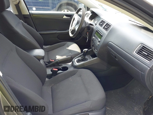 2014 Volkswagen Jetta S with VIN 3VW2K7AJ2EM352047, listed as a IAAI auction lot 42556420 with 104,798 mi miles and . Bid and sale history available at DreamBid. Image 5.