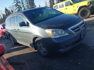2005 Honda Odyssey EX-L with VIN 5FNRL38685B423426, listed as a IAAI auction lot 41519779 with 423,419 mi miles. Bid and sale history available at carsss.com. Image 1.