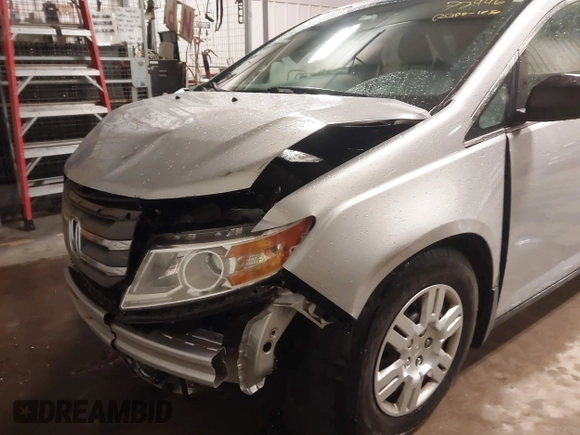 2012 Honda Odyssey LX with VIN 5FNRL5H27CB092988, listed as a IAAI auction lot 41933507 with 123,233 mi miles and . Bid and sale history available at DreamBid. Image 19.