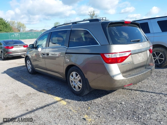 2012 Honda Odyssey LX with VIN 5FNRL5H29CB091860, listed as a IAAI auction lot 42000688 with 295,551 mi miles. Bid and sale history available at carsss.com. Image 3.