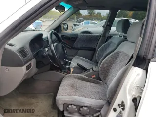 1999 Subaru Forester S with VIN JF1SF6555XH730230, listed as a Copart auction lot 71795924 with 103,455 mi miles and Salvage Title. Bid and sale history available at carsss.com. Image 7.
