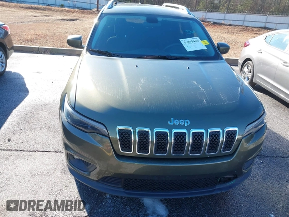 2019 Jeep Cherokee Latitude with VIN 1C4PJLCB3KD416517, listed as a IAAI auction lot 41275406 with 83,321 mi miles. Bid and sale history available at carsss.com. Image 6.