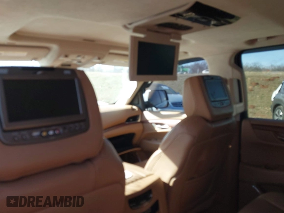 2015 Cadillac Escalade ESV Platinum z VIN 1GYS4UKJ3FR564718, wystawiony jako IAAI lot #41085166 z przebiegiem Nie podano mil oraz . Historia ofert i sprzedaży dostępna na DreamBid. Obrazek 17.