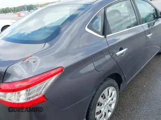 2014 Nissan Sentra S with VIN 3N1AB7AP9EL687513, listed as a IAAI auction lot 42116905 with 148,826 mi miles and . Bid and sale history available at DreamBid. Image 6.