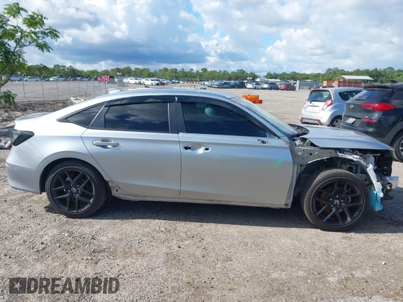 2025 Honda Civic Sport z VIN 2HGFE2F59SH549528, wystawiony jako IAAI lot #42232674 z przebiegiem 8 889 mil mil oraz . Historia ofert i sprzedaży dostępna na DreamBid. Obrazek 13.