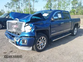 2015 GMC Sierra 1500 Denali z VIN 3GTP1WEC2FG201307, wystawiony jako IAAI lot #41931366 z przebiegiem 99 644 mil mil oraz . Historia ofert i sprzedaży dostępna na DreamBid. Obrazek 16.