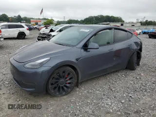 2022 Tesla Model Y Performance with VIN 7SAYGDEF7NF507184, listed as a Copart auction lot 58329875 with 98,320 mi miles and Salvage title. Bid and sale history available at DreamBid. Image 1.