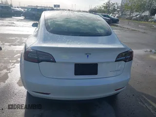 2021 Tesla Model 3 Long Range with VIN 5YJ3E1EB9MF055990, listed as a IAAI auction lot 41584065 with 49,147 mi miles and . Bid and sale history available at carsss.com. Image 17.