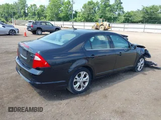 2012 Ford Fusion SE with VIN 3FAHP0HA0CR374615, listed as a IAAI auction lot 42594819 with 124,168 mi miles and . Bid and sale history available at DreamBid. Image 4.