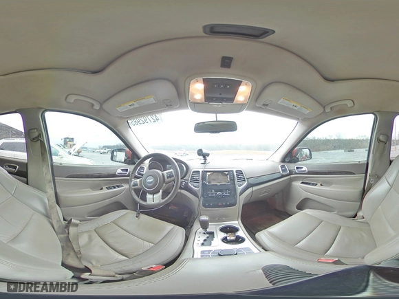 2011 Jeep Grand Cherokee Laredo with VIN 1J4RR4GT1BC542031, listed as a Copart auction lot 42792985 with 221,000 mi miles and Salvage Title. Bid and sale history available at carsss.com. Image 13.