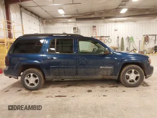 2004 Chevrolet TrailBlazer EXT LT with VIN 1GNET16P046158436, listed as a IAAI auction lot 41707323 with 163,328 mi miles. Bid and sale history available at carsss.com. Image 13.
