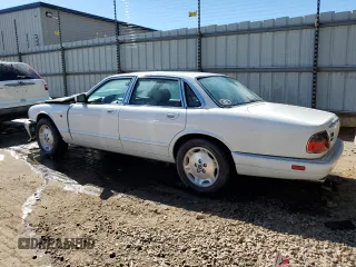 1996 Jaguar XJ with VIN SAJHX1747TC767829, listed as a Copart auction lot 76677444 with Not provided miles and Salvage title. Bid and sale history available at DreamBid. Image 2.