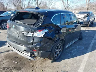 2017 BMW X1 xDrive28i with VIN WBXHT3C37H5F82992, listed as a IAAI auction lot 41293740 with 161,418 mi miles. Bid and sale history available at carsss.com. Image 4.