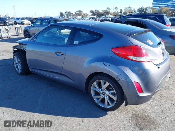 2016 Hyundai Veloster z VIN KMHTC6AD1GU286674, wystawiony jako IAAI lot #41627128 z przebiegiem 71 617 mil mil oraz . Historia ofert i sprzedaży dostępna na DreamBid. Obrazek 3.