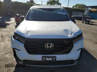 2025 Honda Pilot TrailSport with VIN 5FNYG1H65SB004479, listed as a Copart auction lot 70917734 with 7,582 mi miles and Salvage Title. Bid and sale history available at carsss.com. Image 5.